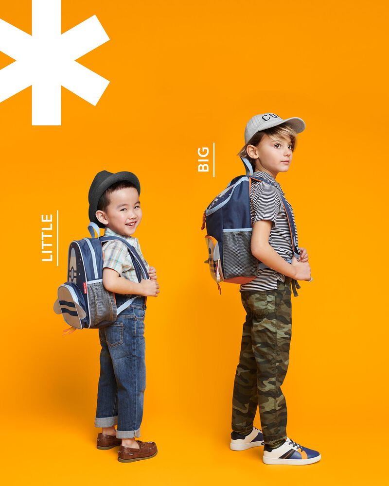 Kid with hot sale big backpack