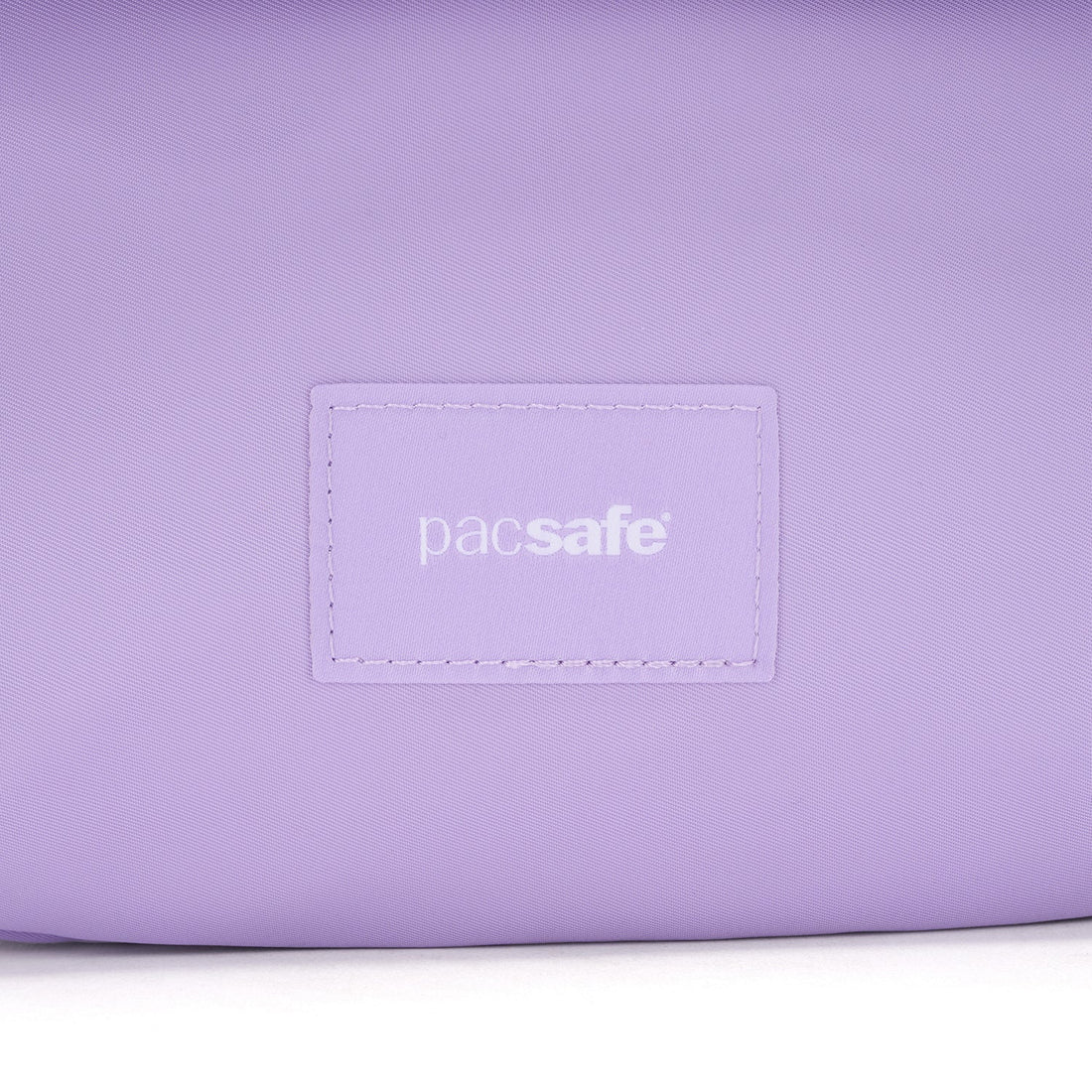 Pacsafe - Go Saddle Crossbody - Lavender — Official product view (35140612)